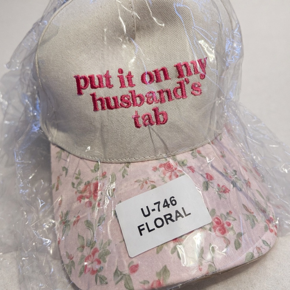 Put it on my husbands tab embroided hat